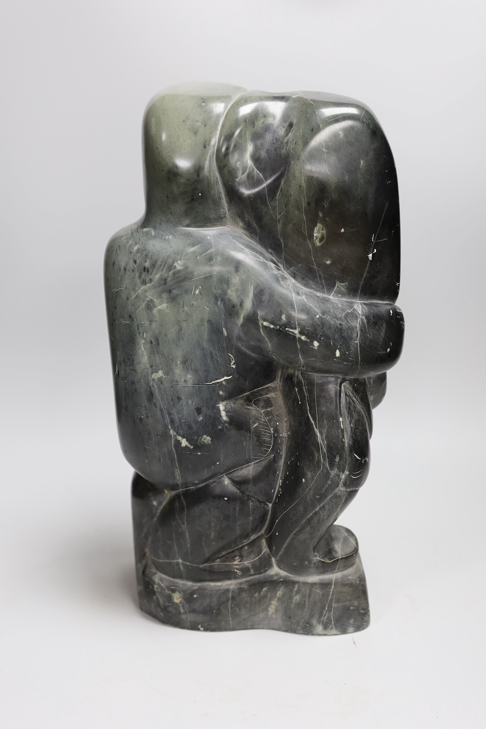 A large Inuit soapstone carving, 36cm, labelled Eskimo art Canada